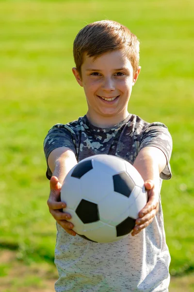 Happy Pre Teen Boy Holding Football Park — Stock Photo, Image