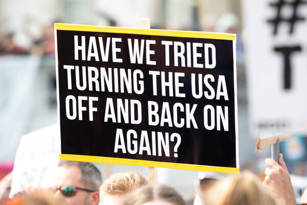 London, United Kingdom, 13th July 2018:Placards carried by anti Donald Trump protesters marching in central London