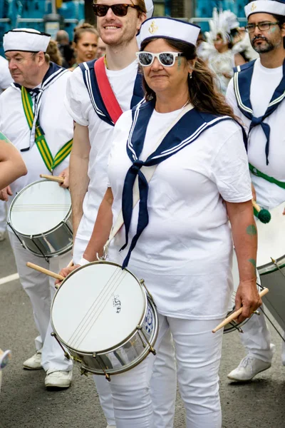 London, Büyük Britanya, 27th Ağustos 2018:-katılımcılar katılın Notting Hill Carival Batı Londra'da, Avrupa'nın en büyük sokak partisi.