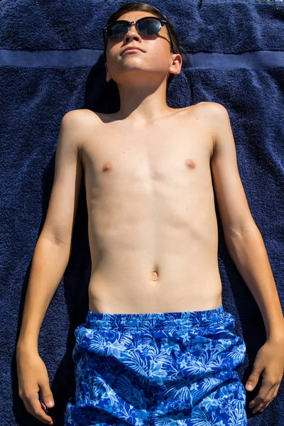 Caucasian Teenage Boy Sunbathing Garden Wearing Sunglasses — Stock Photo, Image