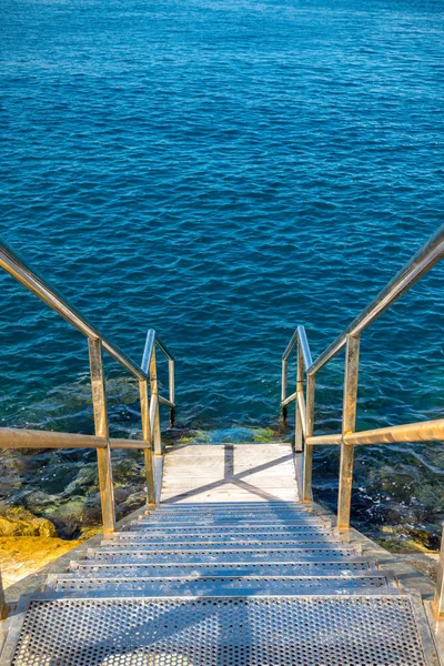 Steps leading into the sea on the West side of the rock of Gibraltar