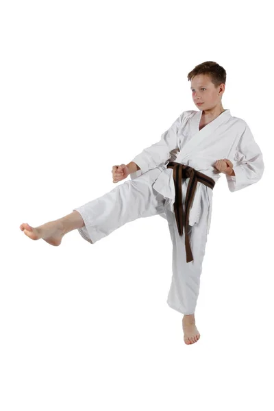 Nastoletni chłopiec robi sztuki walki — Zdjęcie stockowe
