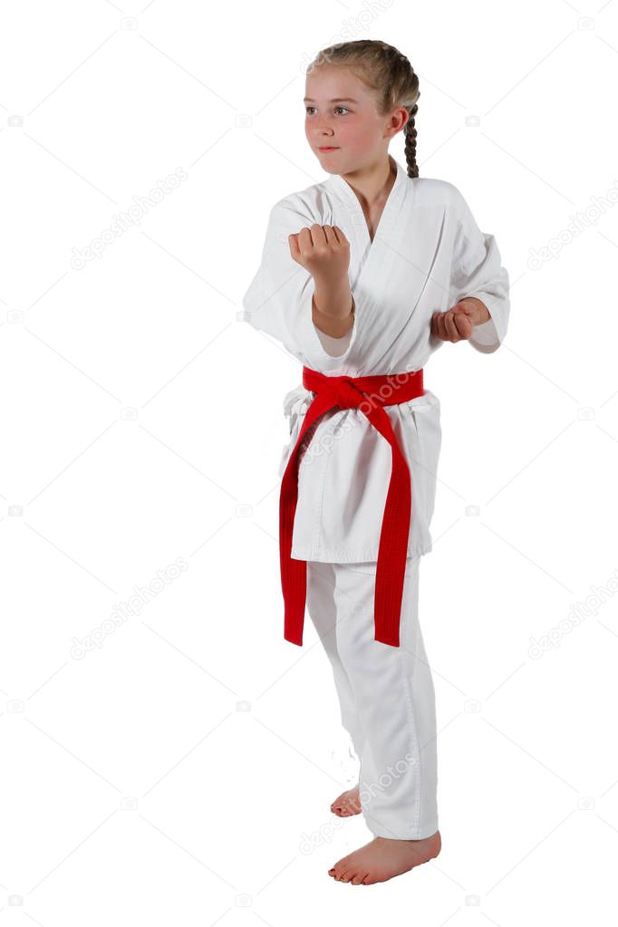 Tweenage girl going karate