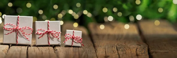 Banner Gifts Old Wooden Floor Christmas Background Bokeh — Stock Photo, Image