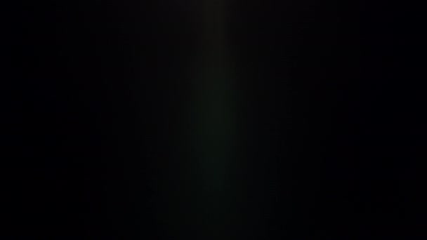 Účinek šplouchnutí světla v čočce. 4k klasické světlo. — Stock video