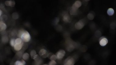 Mercek Bozukluğu 4K Işık Ufku, Parlak Lens parlamaları geçiş, başlık ve kaplama, ışık titreşimleri ve parlamalar için. Koyu arkaplanda gerçek lens VFX ile UHD 'de ışık sızıntısı