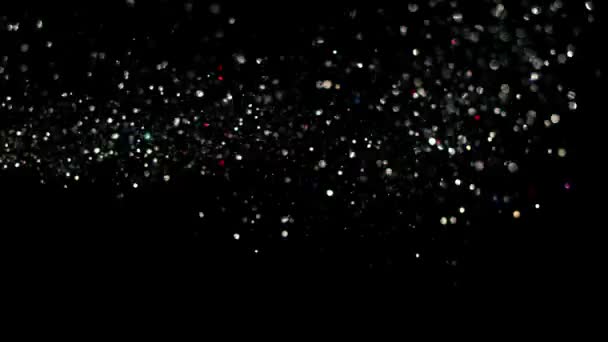Abstrakte Bewegungshintergrund leuchtende Lichtteilchen. Schimmernde Glitzerpartikel mit Bokeh. Nahtlose 4K-Loop-Videoanimation — Stockvideo