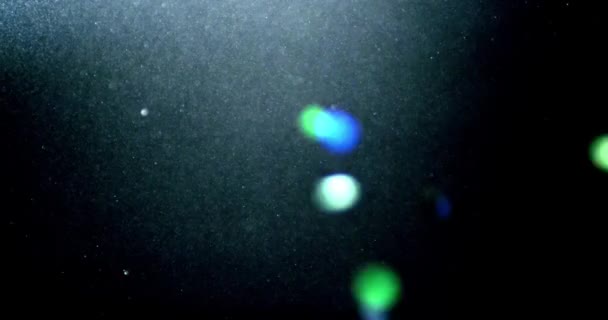 Fond abstrait avec animation de particules volantes et scintillantes comme bokeh de lumière. Animation de boucle sans couture. Bulles de poussière animation neige. — Video