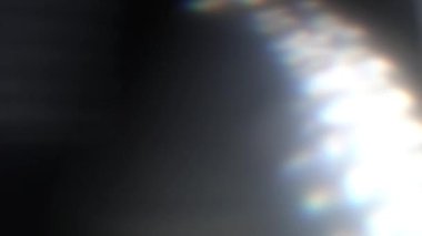 Işık sızıntısı arka plan animasyon stok görüntülerini etkiler. Mercek ışığı etrafta yanıp sönüyor ve soyut bir arka plan animasyonu oluşturuyor. Klasik Light VFX efekti