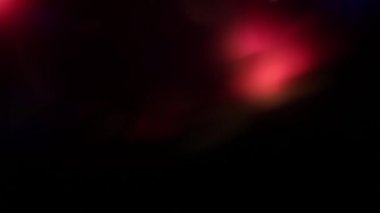 Işık sızıntısı arka plan animasyon stok görüntülerini etkiler. Sızdıran mercek ışıkları soyut bir arka plan animasyonu oluşturuyor..