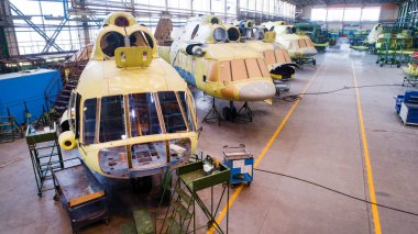 Helicopter aviation plant making process clipart