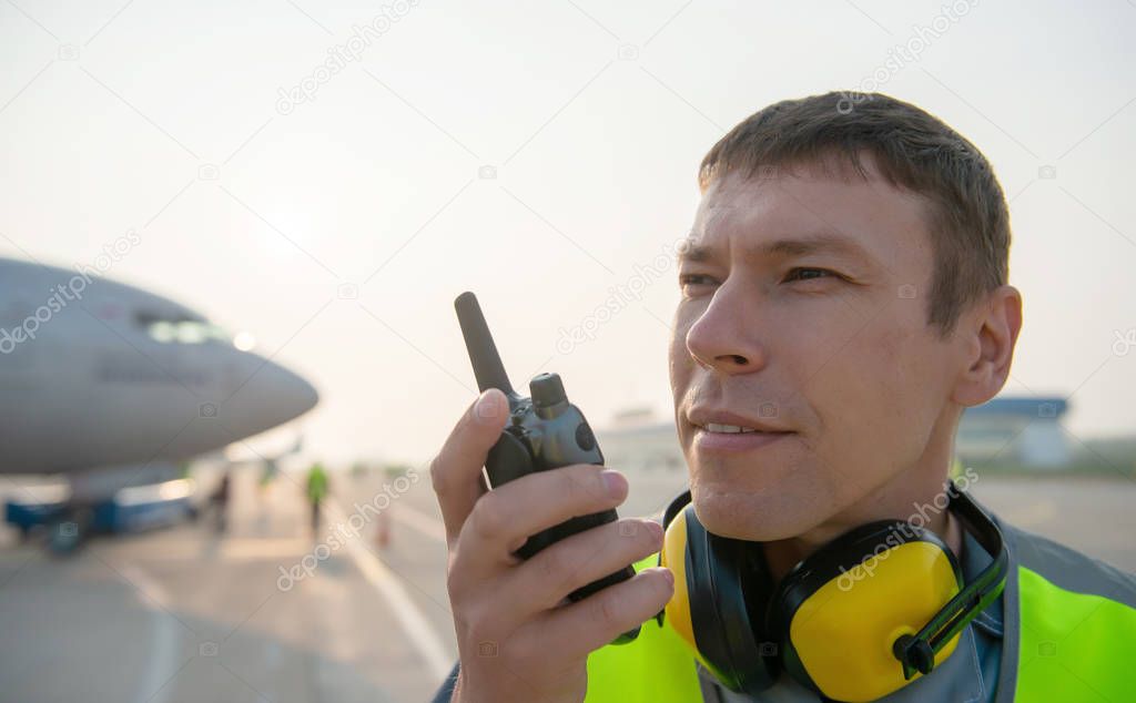 airport worker man male maintenance aircraft airplane