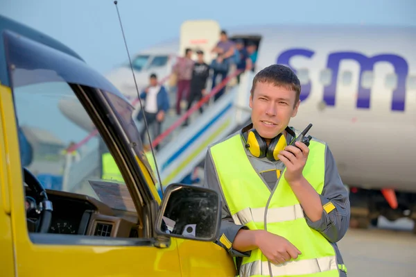 airport worker man male maintenance aircraft airplane