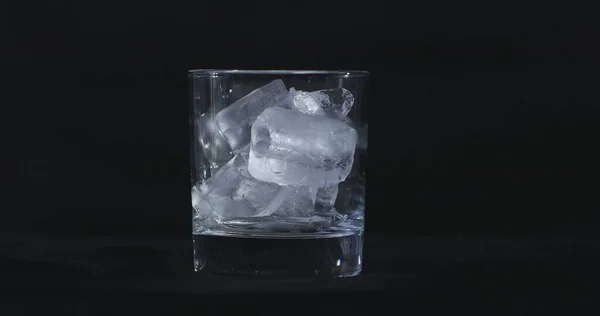 Ice Cubes Melt Alcohol Whiskey Glass Smoke Floating Black Background — Stock Photo, Image
