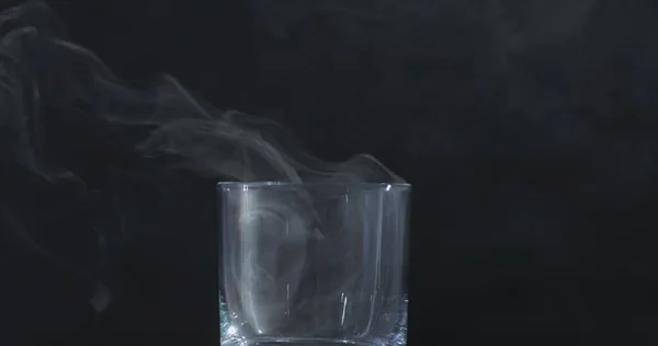 Empty Whiskey Alcohol Glass Black Background Floating Smoke — Stock Photo, Image