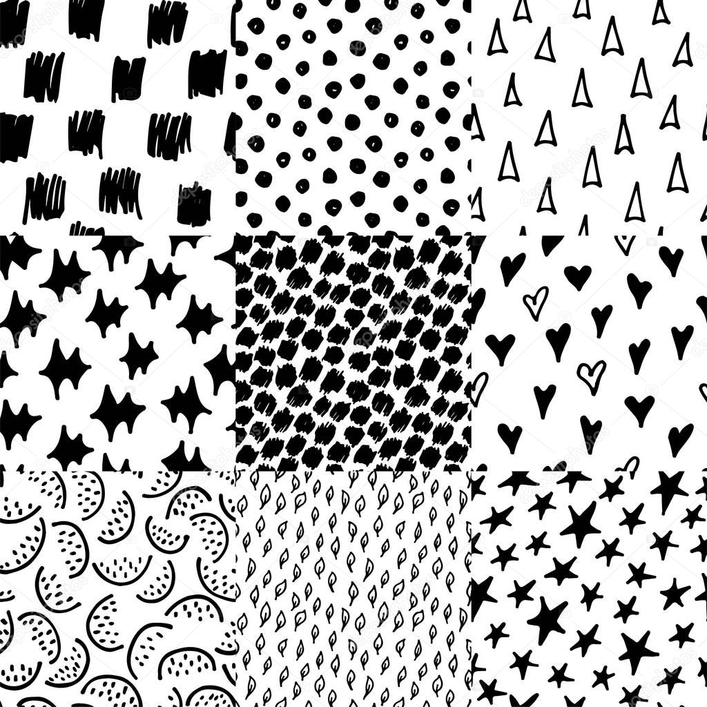 Abstract monochrome hand drawn ink black and white seamless patterns set. Brush doodle vector repeated illustration for paper, textile, greeting card, print design.