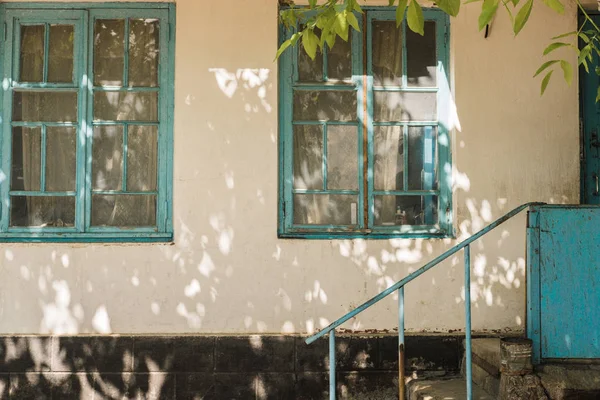 Blue wooden window of an old country house. — Stock Photo, Image