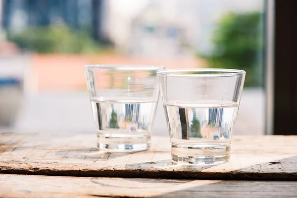 Two Glasses Water Table Wooden Background — Stock Photo, Image