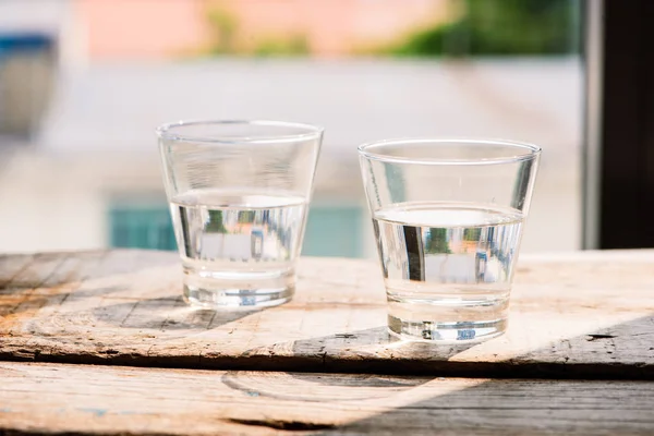 Two Glasses Water Table Wooden Background — Stock Photo, Image