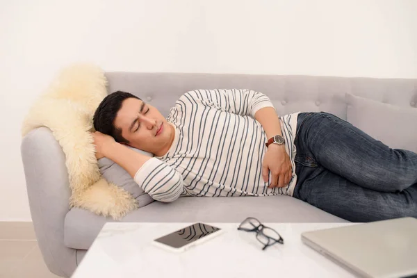 Handsome Young Man Suffering Stomach Ache While Lying Sofa Home — Stock Photo, Image