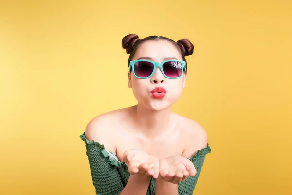 Fashionable Asian Woman Trendy Sunglasses Sending Air Kiss Bright Yellow — Stock Photo, Image