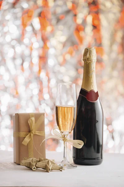 Champagne Glass Bottle Gift Box Christmas Ornaments Silver Glitter Background — Stock Photo, Image