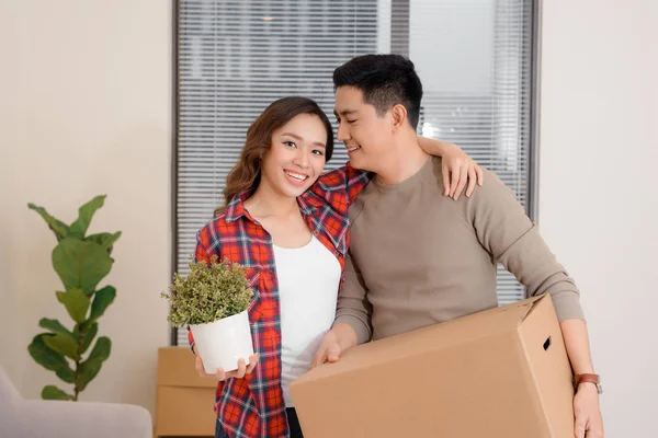 Young couple moving to new apartment together