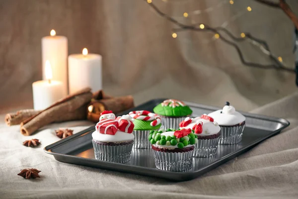 Christmas Decoration Cupcakes Tray Candles Background — Stock Photo, Image