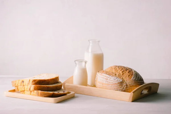 Sliced White Sliced Bread Plate Butter Bottles Milk White Table — Stock Photo, Image