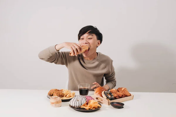 Portrait Asian Man Sitting Snacking Donuts Isolated White Background Fat — 图库照片