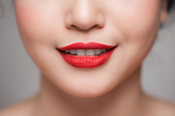 Close-up of beautiful perfect red lips. Selective focus.