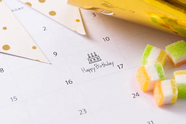 writing cake on calendar happy birthday