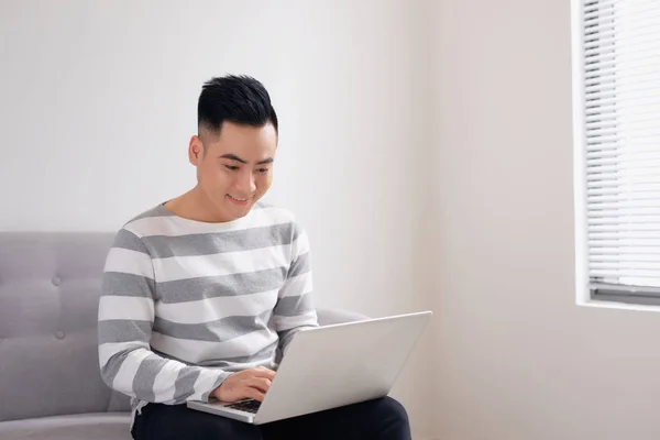 Happy Smiling Young Man Watching Working Computer Laptop Home — Stock Photo, Image