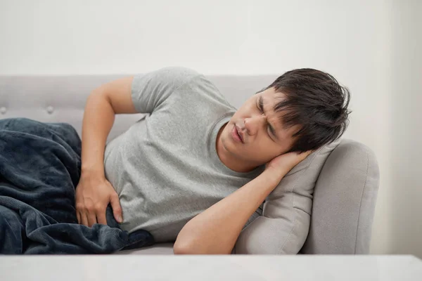Sick Man Lying Couch — Stock Photo, Image