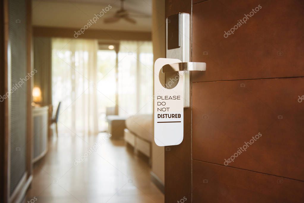 Hotel room with please do not disturb sign