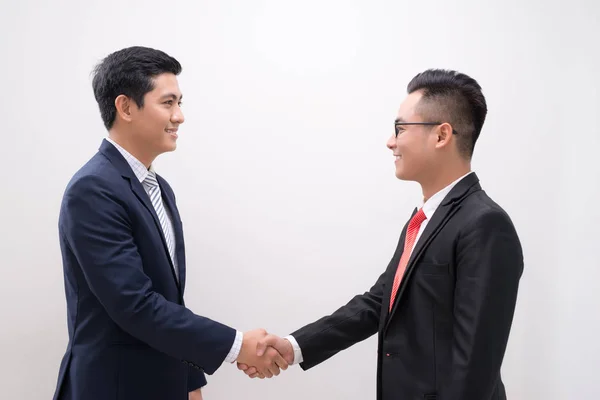 Side View Two Smiling Young Businessmen Shaking Hands White Background — Stock Photo, Image