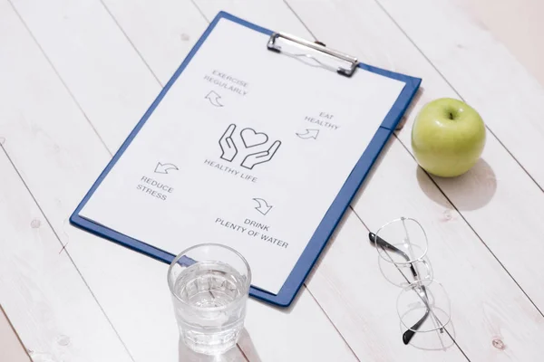 High Angle View Of A Meal Plan Concept On Wooden Desk