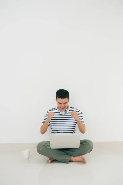 Portrait Happy Young Man Using Laptop Celebrating Success Isolated White — Stock Photo, Image