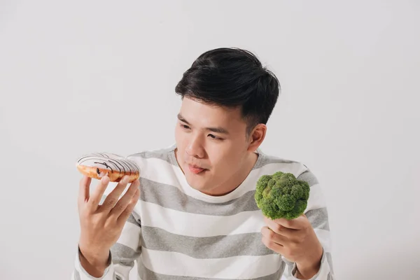 Man Having Hard Choice Healthy Unhealthy Food — Stock Photo, Image