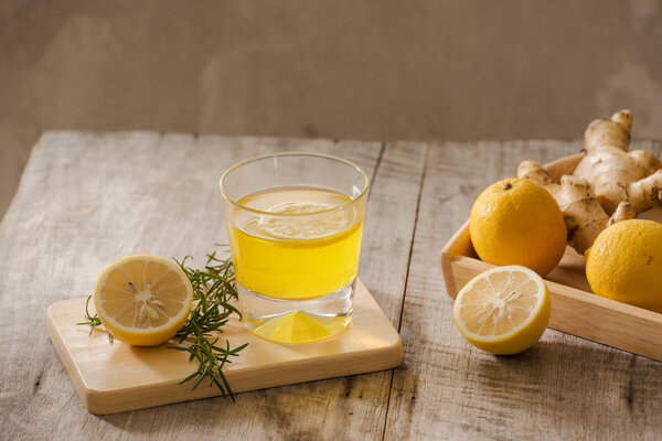 Ginger Ale or Kombucha in Bottle - Homemade lemon and ginger organic probiotic drink, copy space.