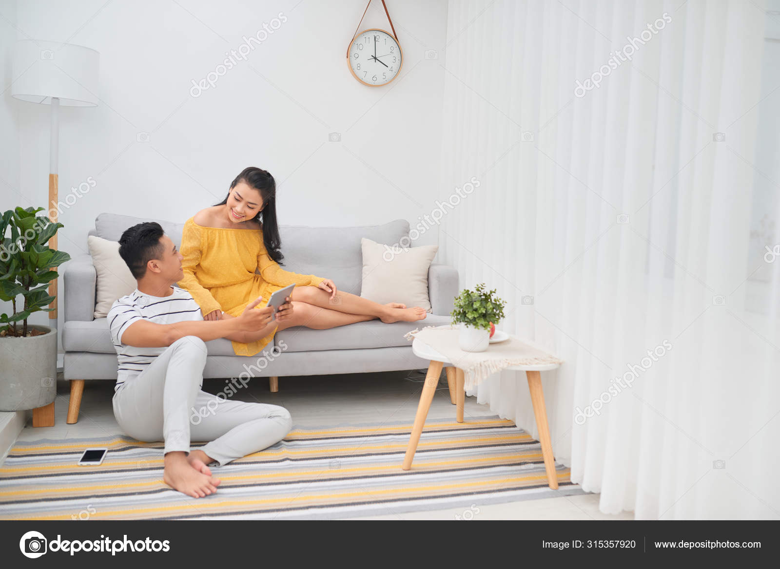 Asian couple in the living room