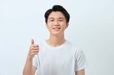 Aferin sana, yüz ve baş parmak işareti.