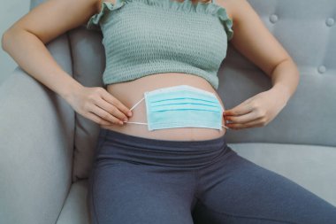 Covid-19 Coronavirüsünden uzak dur. Hamilelik.