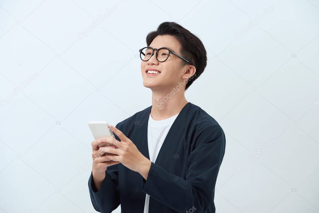 Asian man with smart phone isolated on white background