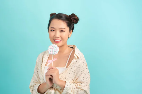 Teenager Asian Girl Holding Lollipop Isolated Blue Background — Stock Photo, Image