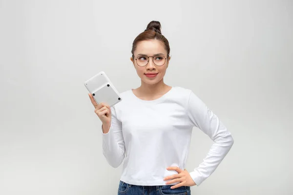 Young Woman Looking Camera Calculator Hand — Stock Photo, Image