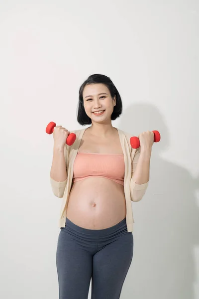 Close Mulher Grávida Fazendo Exercícios Com Halteres Quarto — Fotografia de Stock