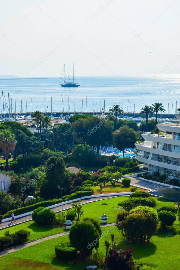 Marina Baie des Anges landscape on against backdrop of Mediterranean Sea with yachts and sailboats and the city of Nice in the background. Region Provence-Alpes-Cte d'Azur. Villeneuve-Loubet. France