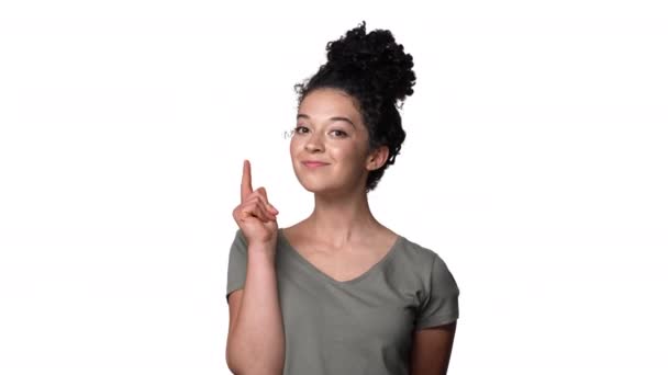 Portrait Of Seductive Woman 20s In Casual T Shirt With Hair In Bun