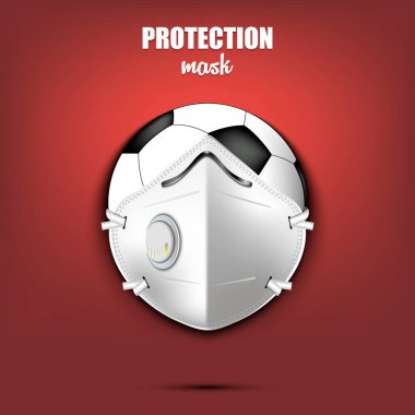 Koruyucu maskeli futbol topu.